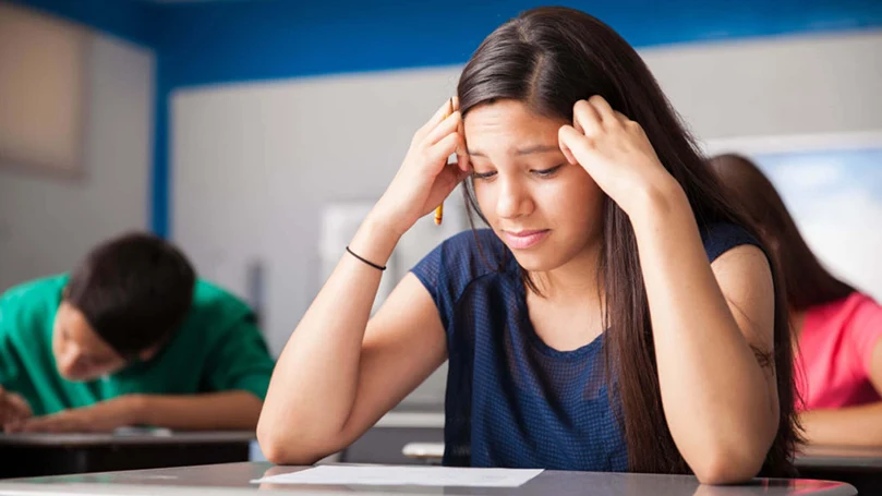 a girl failing a test