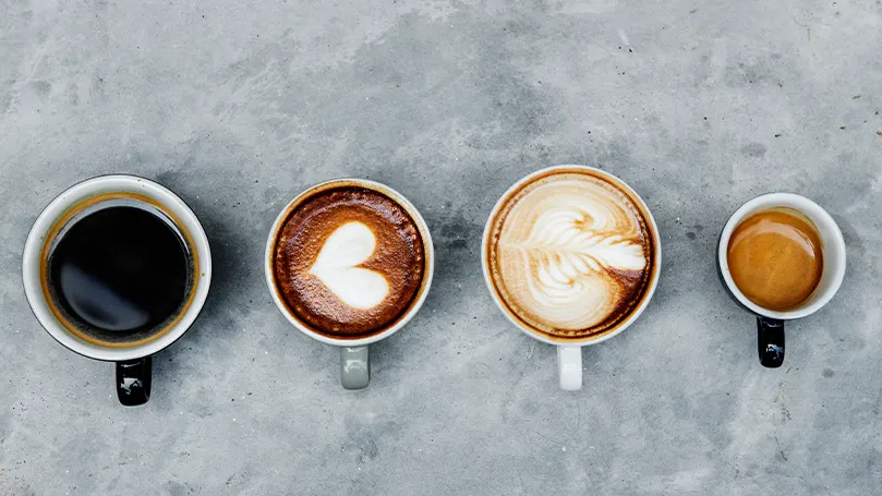 Un'immagine di quattro diverse tazze di caffè