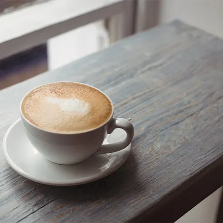 An image of a cup of coffee on a table.